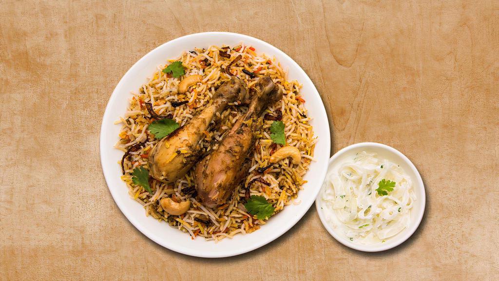 Chicken Biryani Theory · Aromatic rice cooked with chicken tenders, Indian spices, and herbs.