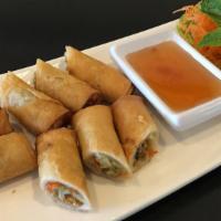 Veggie Crispy Spring Rolls  · Silver noodles, dried mushrooms, and cabbage served with sweet and sour sauce.