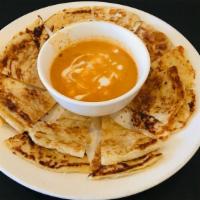 Roti with Curry Sauce · Crispy roti Prata with curry sauce