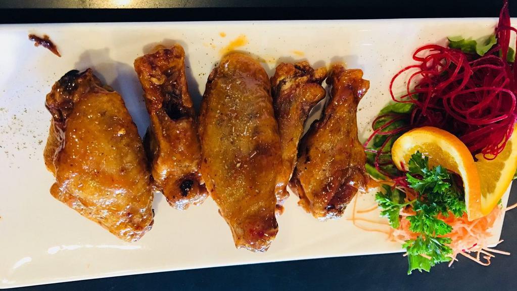 Fried Chicken Wings (6 pieces) · Fried chicken wings tossed in your choice of sauce: BBQ sauce, Mango habanero sauce or Terriyaki sauce