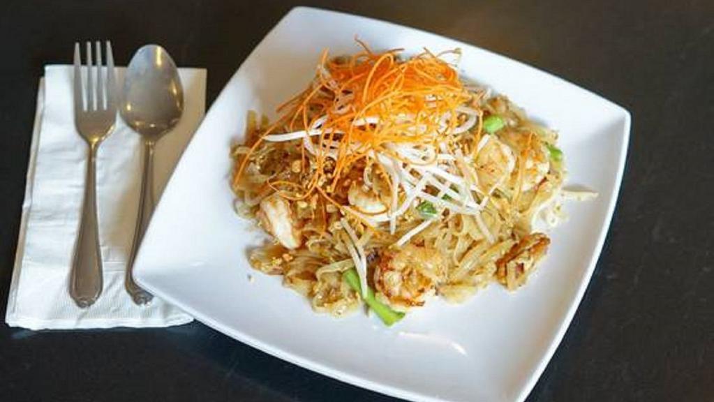 Pad Thai Noodle · Pan-fried rice noodles with tofu, egg, bean sprouts, green onion, PEANUTS in tamarind sauce.