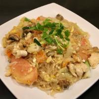 Pad Woonsen · Stir-fried silver noodle, corn, cabbage, onion, tomato, carrots, mushrooms.