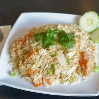 Thai Fried Rice · With eggs, carrots, onions, and tomatoes.