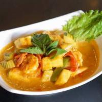 Panang Curry · With bell pepper, zucchini, carrots, basil and PEANUT sauce in panang curry.