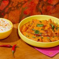 Butter Chicken · Spicy chicken in a buttery tomato sauce. Includes side of Rice.