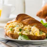 Breakfast Croissant · Freshly scrambled eggs and a slice of provolone cheese served on flaky and buttery croissant.