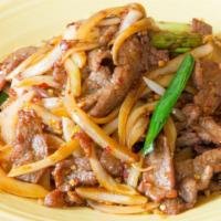 B1 Mongolian Beef · Hot & spicy. Sliced tender beef sauteed with strands of green onions and roasted red peppers...