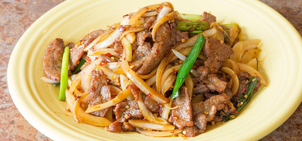B1 Mongolian Beef · Hot & spicy. Sliced tender beef sauteed with strands of green onions and roasted red peppers in our house sauce.