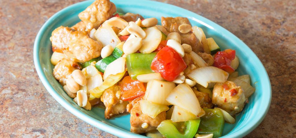 C6 Kung Pao Chicken · Hot & spicy. A generous blend of diced chicken stir fried with zucchini, bell peppers, onions, water chestnuts and peanuts in our spicy kung pao sauce.