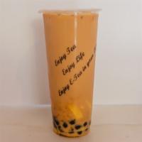 4. Hokkaido Milk Tea · Also available in hot. With boba and pudding.