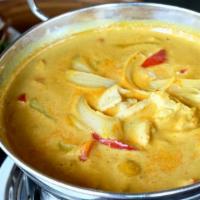 48. Yellow Curry · Chicken, beef or pork cooked in coconut milk with curry powder, potatoes, yellow onions, and...