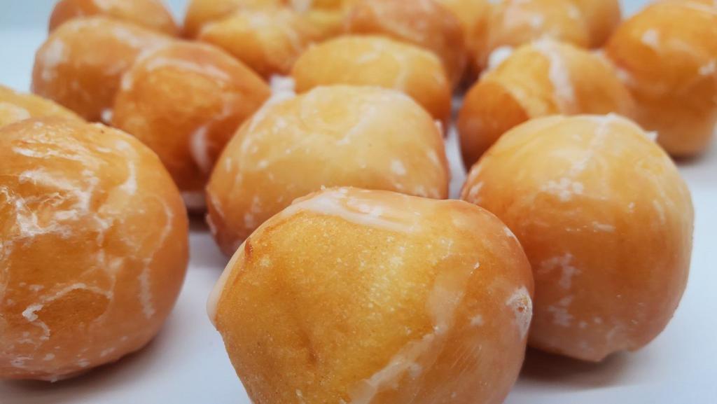 Doz Donut Holes · 1 Dozen Donut Holes
(choose Glazed, Sugar or Mixed Donut Holes)