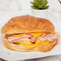 #8 - Croissant Breakfast: Ham, Egg and Cheese · Mayo & Jalapeños Available upon request.
(Choice of Cheeses: American, Cheddar & Swiss)