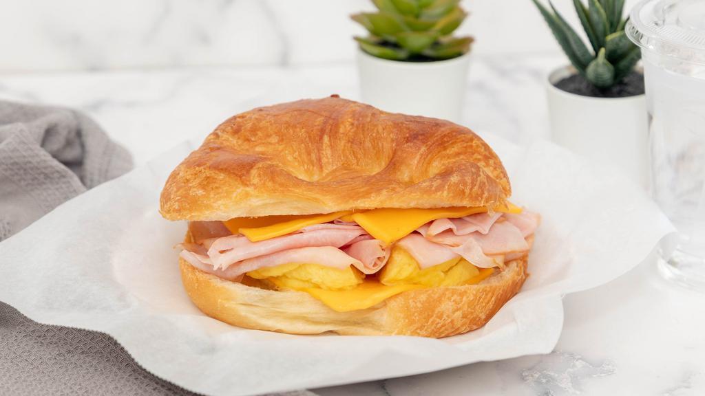 Ham Egg & Cheese Croissant · We freshly make it when you order.