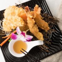 #12. Tempura Mix · Deep fried shrimps and assorted vegetables.