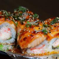 #13. Lion King Roll · Real crab meat, avocado top with salmon, baked & creamy sauce.