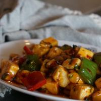 Kung Pao Paneer · Gluten free. Spicy.  Cubed paneer, bell pepper, water chestnut, peanuts, dry red chili. Dry ...