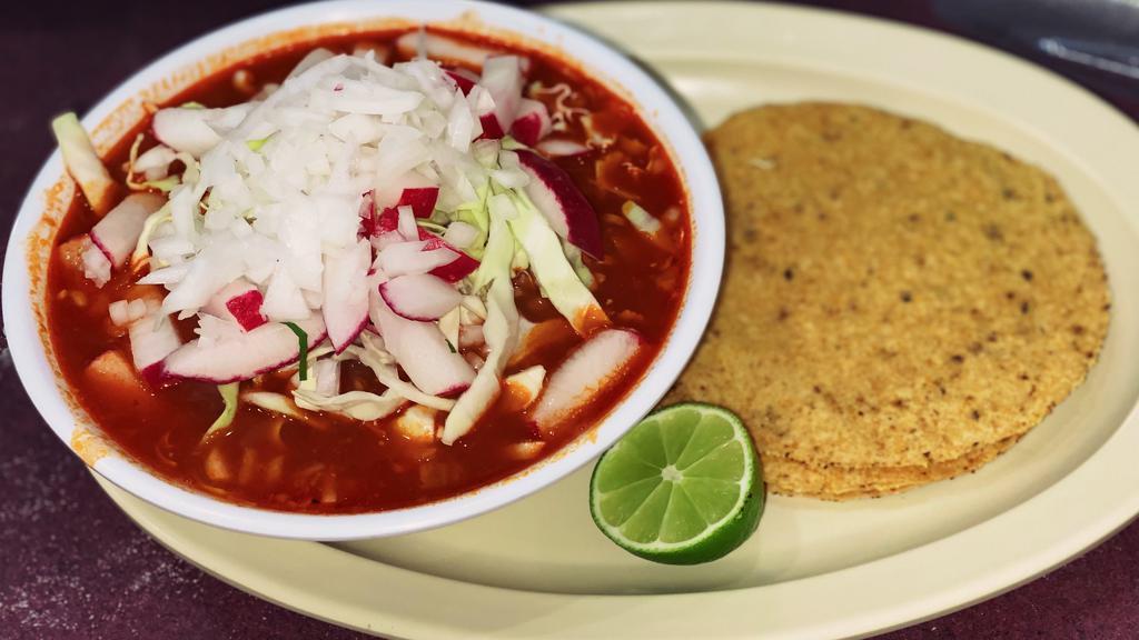 Pozole · Served with cabbage, onion, radish, lime and tostadas