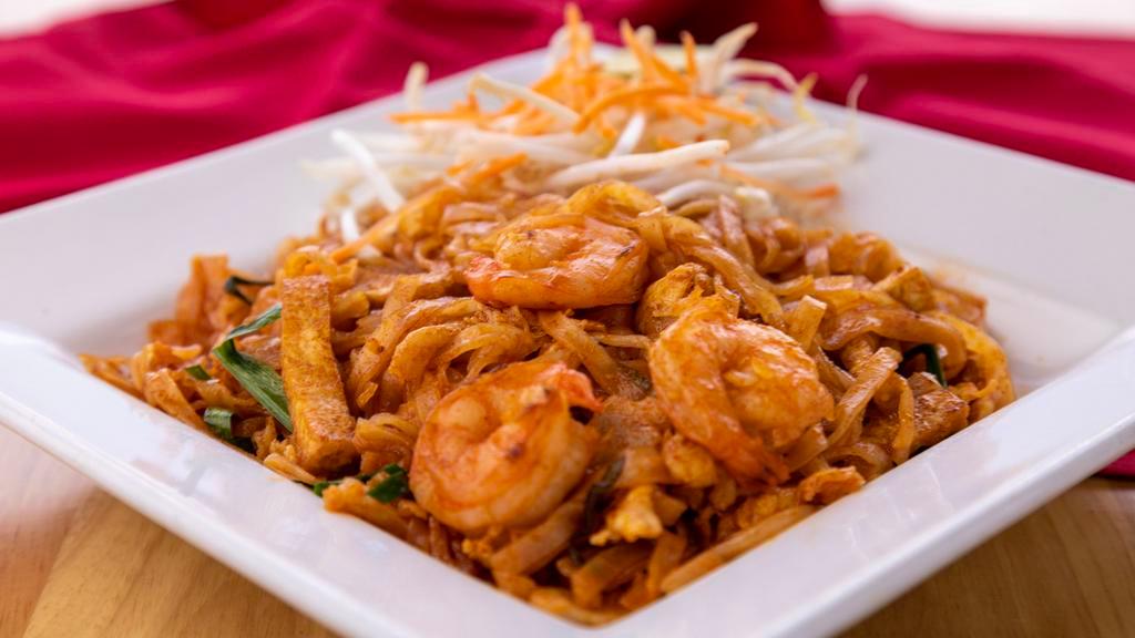 27. Pad Thai · Rice stick noodle with Choice of meat, egg, dried shrimps, tofu,chive and bean sprout topped with peanut.