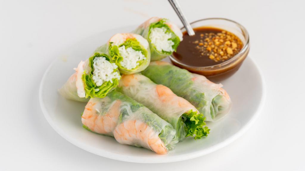 Traditional Shrimp Rolls (3) · Steamed shrimp wrapped in rice paper with lettuce, mint leaves, bean sprouts, and rice noodle. Served with hoisin peanut sauce.