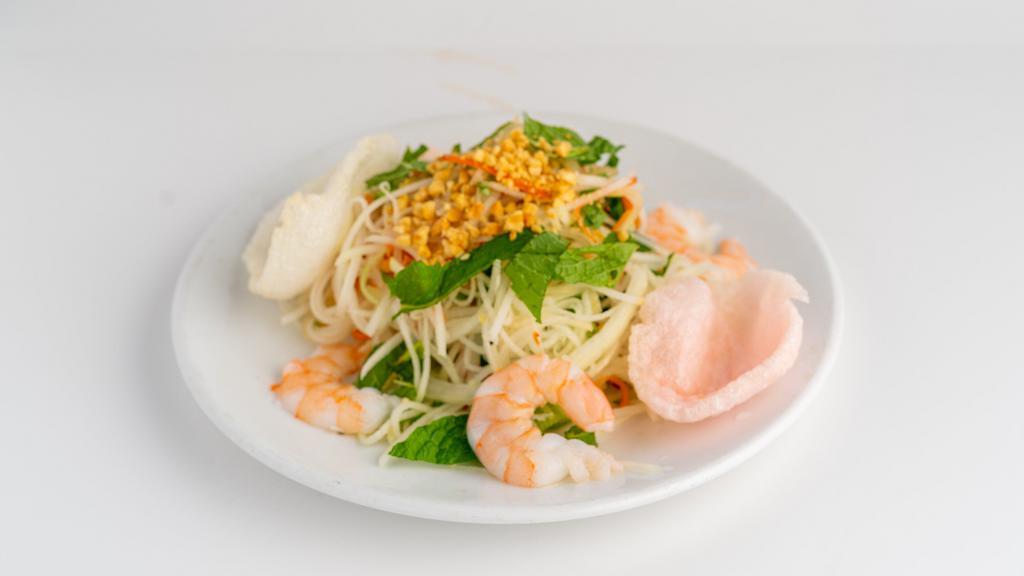 Green Papaya Shrimp Salad · Steamed shrimp mixed with shredded green papaya, tofu, carrot red onion, mint leaves an ground peanut. Served with special house salad dressing.