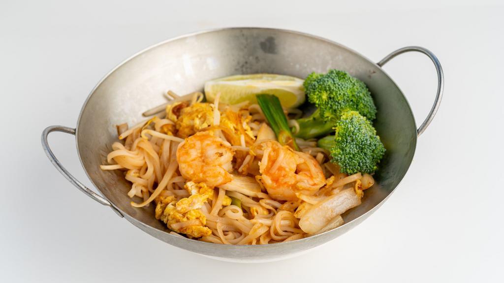 Pad Thai (Thai Style) · Choice of chicken Or shrimp, bean sprouts and egg with rice noodles, topped with crusted peanuts and lime