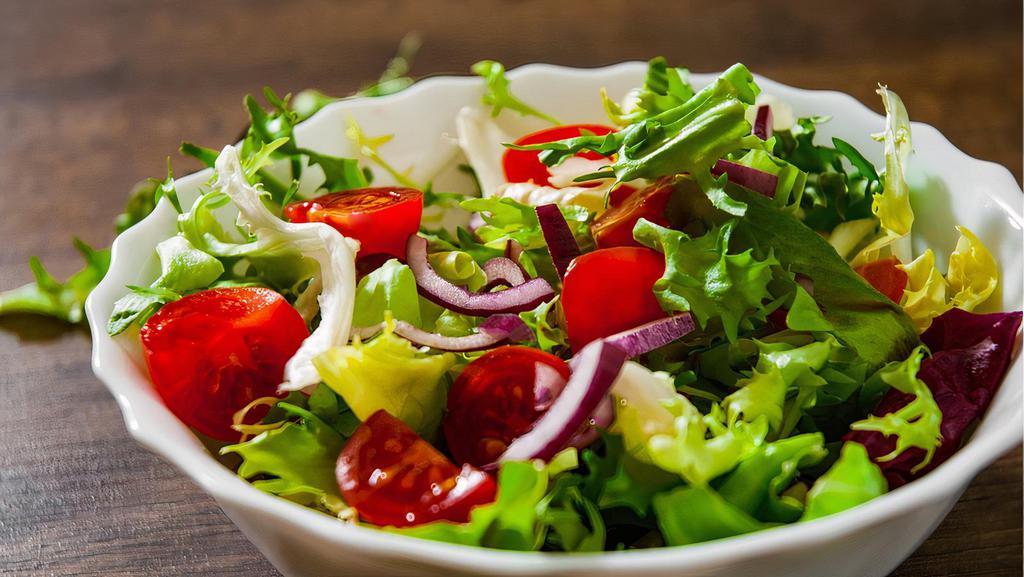 Garden Salad · Romaine & mixed greens, cherry tomatoes, cucumber, onion and avocado with your choice of dressing