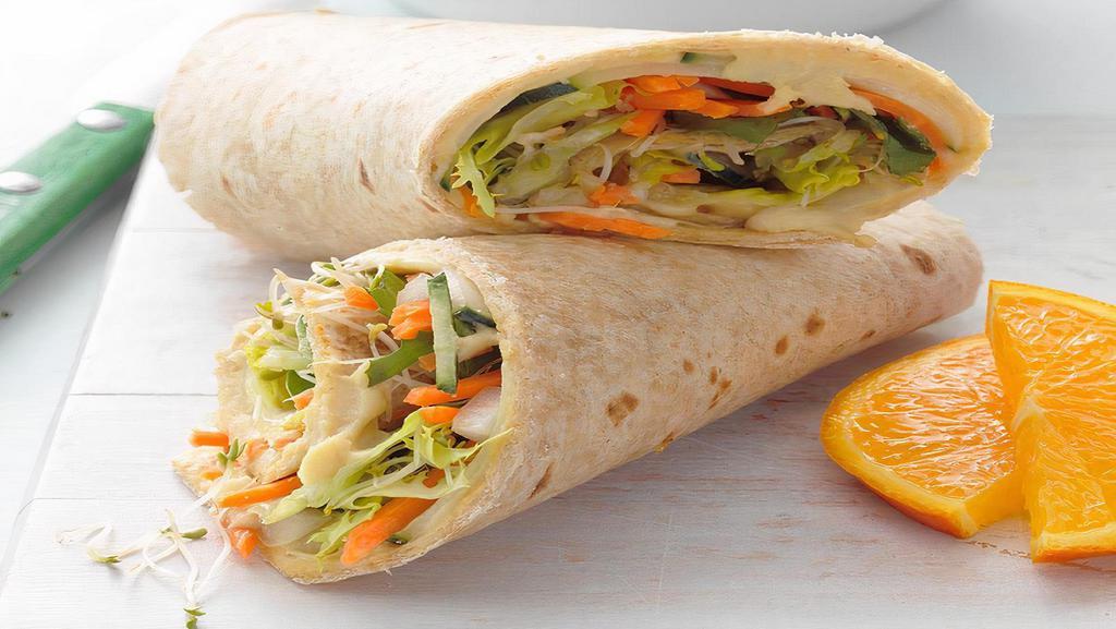 Veggie Tale Wrap · Veggie pita pocket: avocado, sprouts and hummus with shredded lettuce, tomatoes and red onion