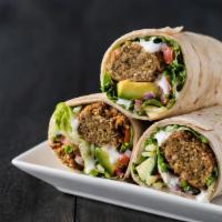 Fried Chicks Wrap · Falafel, hummus spread and tahini dressing with shredded lettuce, tomatoes and red onion
