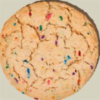 Confetti Cookie · Fluffy, chewy, sugary, and buttery, with a B’day punch of vanilla and rainbow sprinkles.