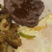 Chicken Fried Steak & Eggs · Two eggs any style, chicken fried steak smothered in country gravy, served with fresh biscui...