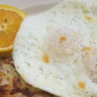 2 Eggs Any Style · Served with your choice of home fries or hash browns, and toast or served with two hot cakes.