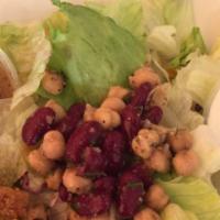 Cobb Salad · Turkey, bacon, bleu cheese, avocado, diced egg, and tomato wedges on shredded lettuce.