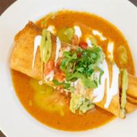Chimichanga · Deep-fried burrito placed over chipotle sauce and covered with sour cream and salsa. Guacamo...