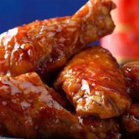 Juicy Honey BBQ Chicken Wings  · Hand-battered chicken wings never frozen tossed in our honey BBQ sauce
