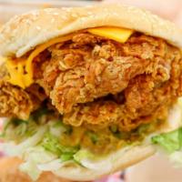 Fried Chicken Sandwich with Fries · Crispy battered chicken,fresh never frozen lettuce, premium Mayo, and creamy cheese on a gor...