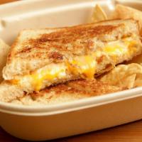 Grilled Cheese On Sourdough · Swiss and Cheddar Cheese, Garden Herb Infused Butter, Wine Grain Mustard, Fig Spread. 
Serve...
