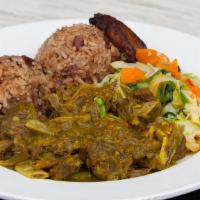 Curried Goat Meal · Tender cubes of succulent goat meat (bone in) marinated with Jamaican curry and spices, rice...