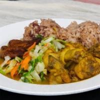 Curried Chicken Meal · Tender cubes of bone in chicken in savory curry sauce served with rice and peas, sautéed veg...