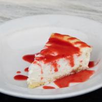 Drunken Cheese Cake · Traditional Cheese Cake infused with Rum Flavor and strawberry sauce glaze