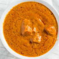 PANEER TIKKA MASALA · Home made cubed paneer simmered in a creamy tomato sauce and spices