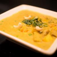NAVRATAN KORMA · Mixed vegetable cooked using onion tomatoes with cream and cashew nuts