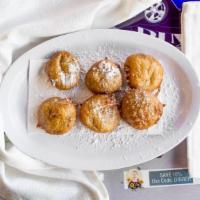 Deep Fried Oreos · A mouth-watering treat of battered, deep fried Oreo goodness!