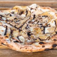 TKO · Thinly sliced portobello mushrooms with fresh mozzarella and Parmesan, drizzled with truffle...
