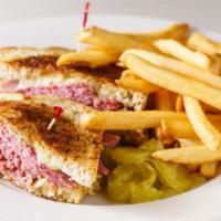 Reuben · Corned beef on rye with melted Swiss and sauerkraut.