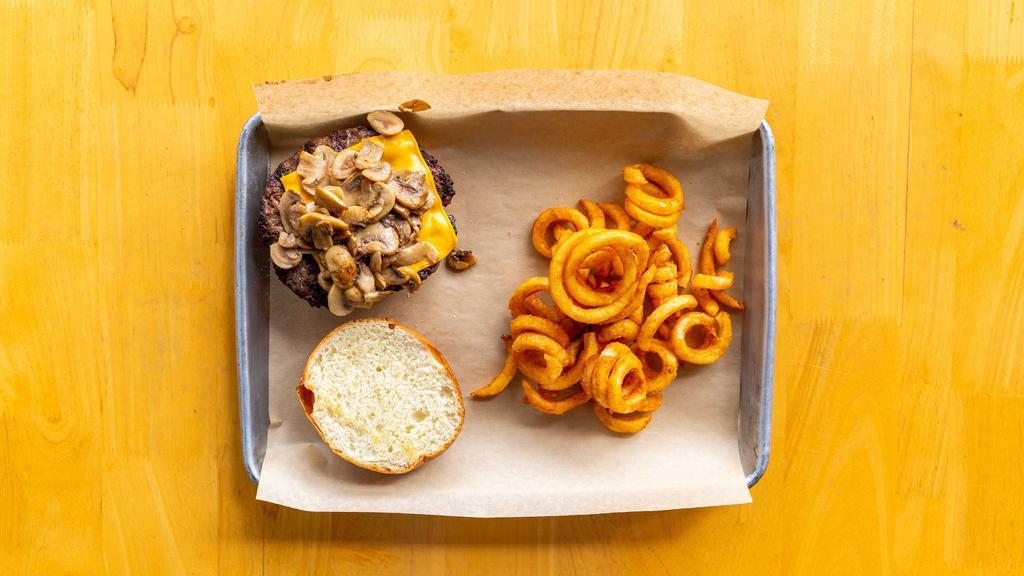 Mushroom Cheeseburger · Our 7oz Niman Ranch burger with grilled mushrooms and American cheese.