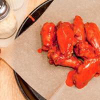 Classic Wings (6 Pieces) · A classic with rich, buttery buffalo flavor. Classic 100 cal. Per wing, boneless 90 cal. Per...