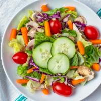 Garden Salad (Individual) · Fresh mixed green salad with mushrooms, tomatoes, carrots, cucumbers and garlic Parmesan cro...