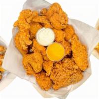 Chicken & Tenders · Twelve pieces Chicken Mix, six pieces Cajun Tenders six Biscuits & Family Fries.
