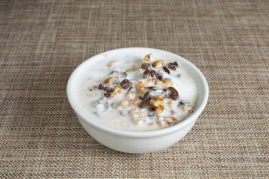 Deluxe Oatmeal* · Organic oatmeal, coconut, walnuts, raisins, brown sugar, steamed milk, and syrup